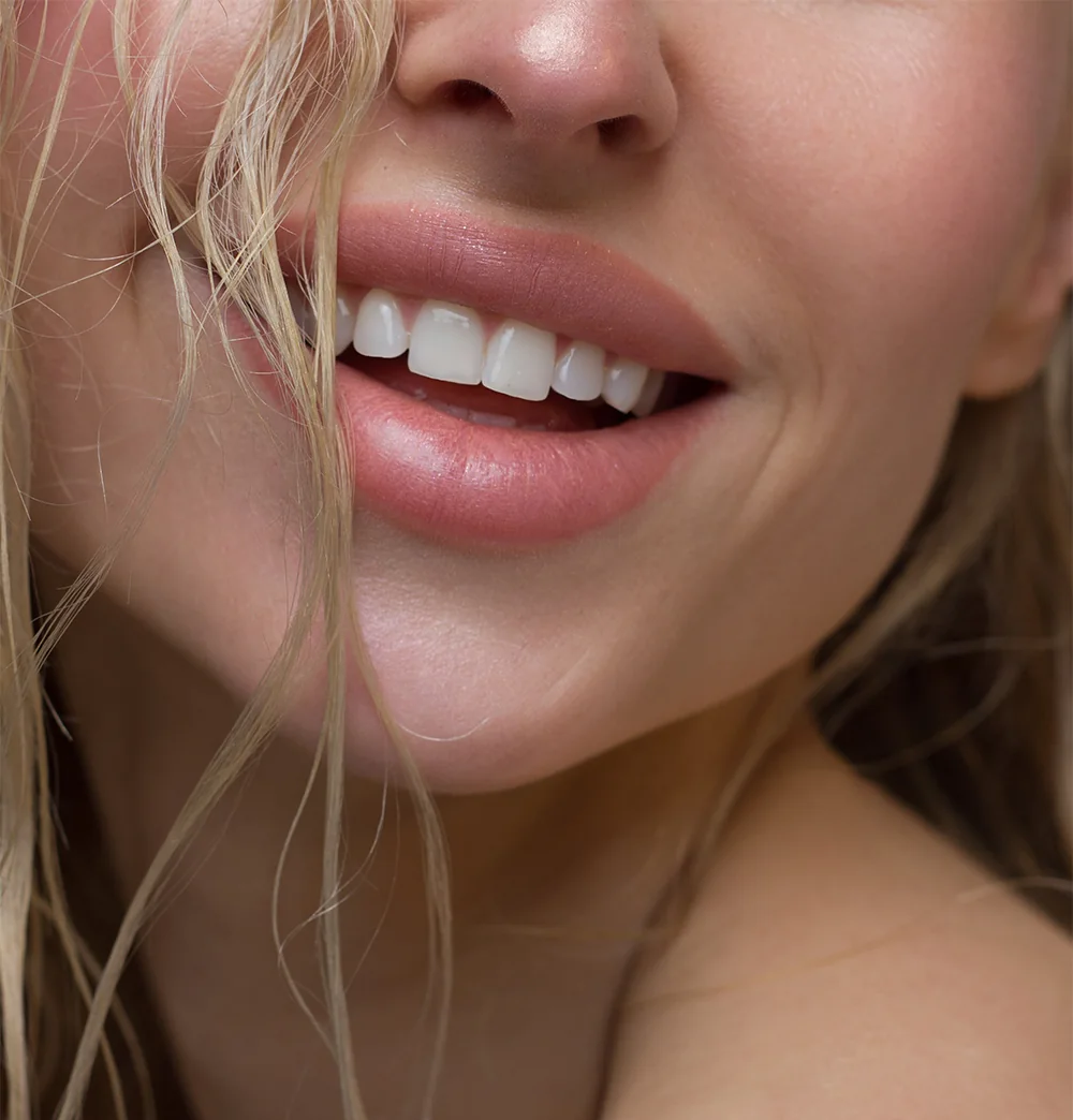 https://www.trueblueaesthetics.com/wp-content/uploads/2023/06/beautiful-lips-smile.webp